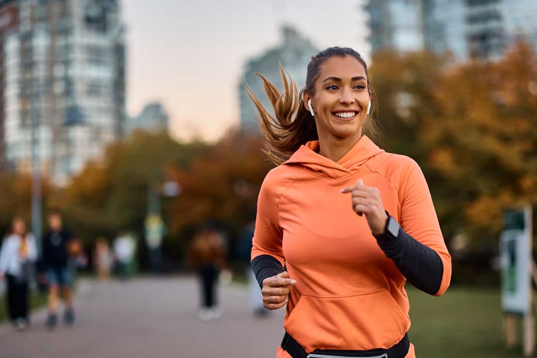 woman-smiling-jogging woman-smiling-jogging