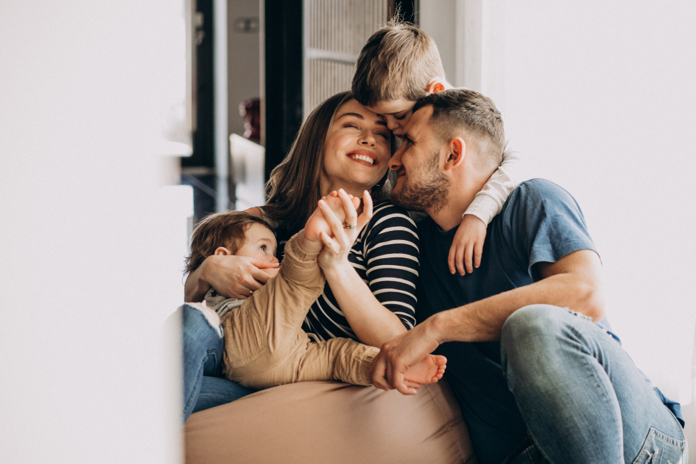 Family relaxing together at home, representing the Brownwood-area households who bring their insurance questions to Insurance Specialists Inc